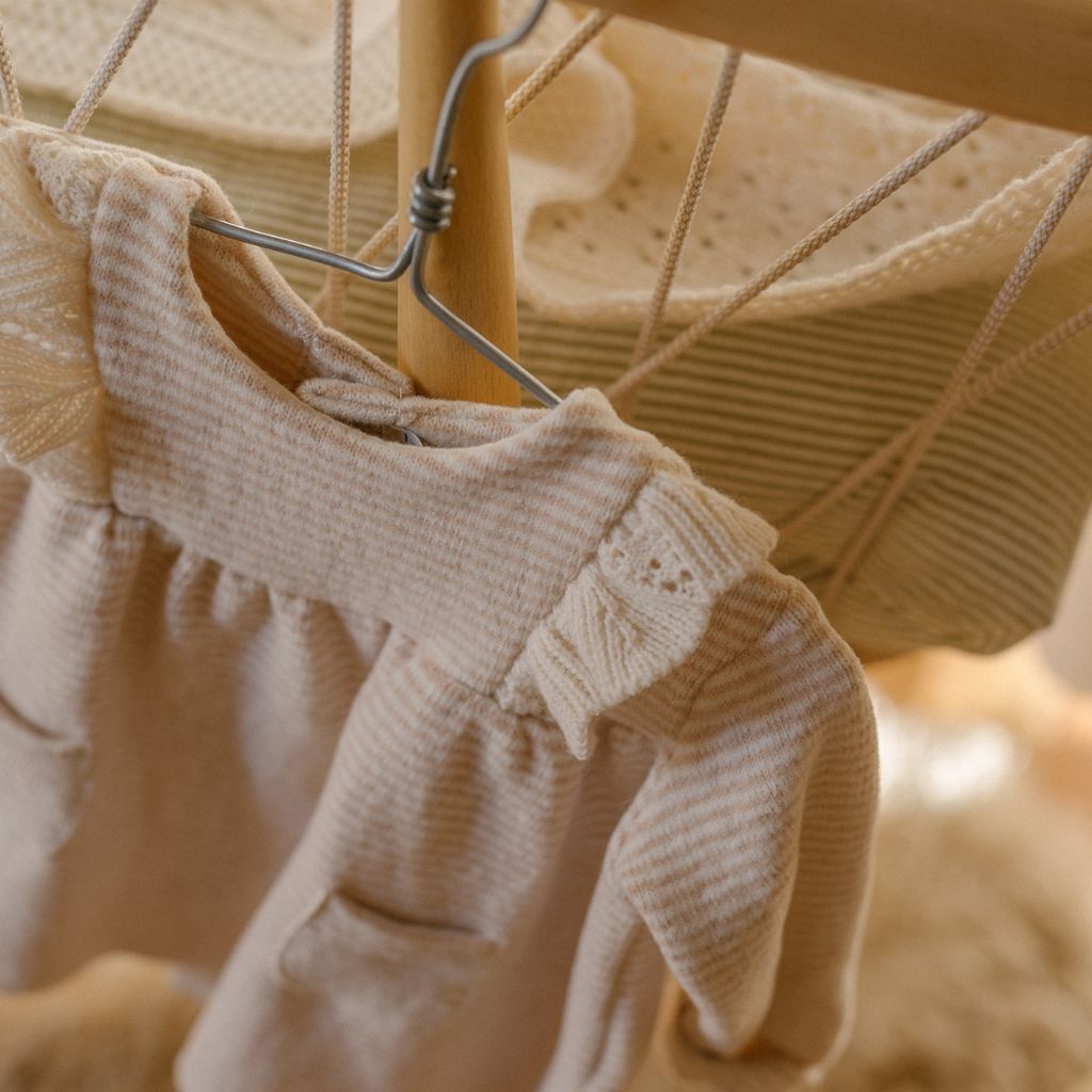 1 + in the Family TALENCE ivory newborn dress in soft capsule fleece with a flared A-line skirt