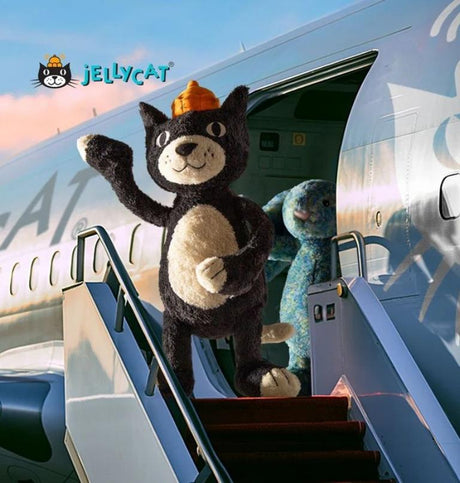 Jellycat plush cat and bunny toys stepping off an airplane, featured in a playful travel-themed image by Kolkid.