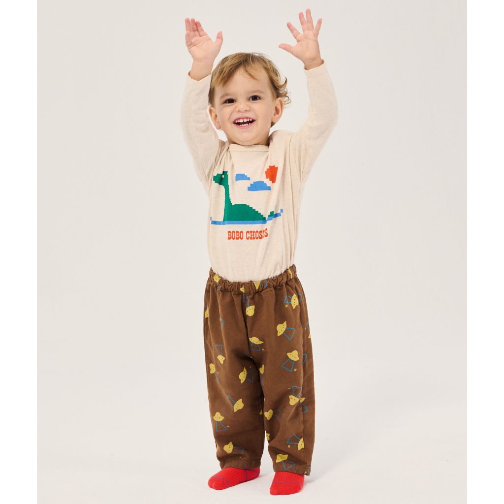 Bobo Choses Baby Pixel Abduction woven pants in brown lyocell and cotton, pixel print, relaxed leg