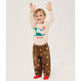 Bobo Choses Baby Pixel Abduction woven pants in brown lyocell and cotton, pixel print, relaxed leg
