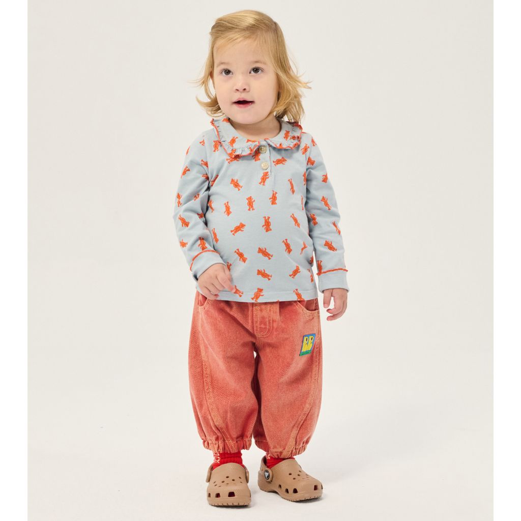 Bobo Choses Baby Tag denim pants in red organic cotton, five pocket cut, logo tag