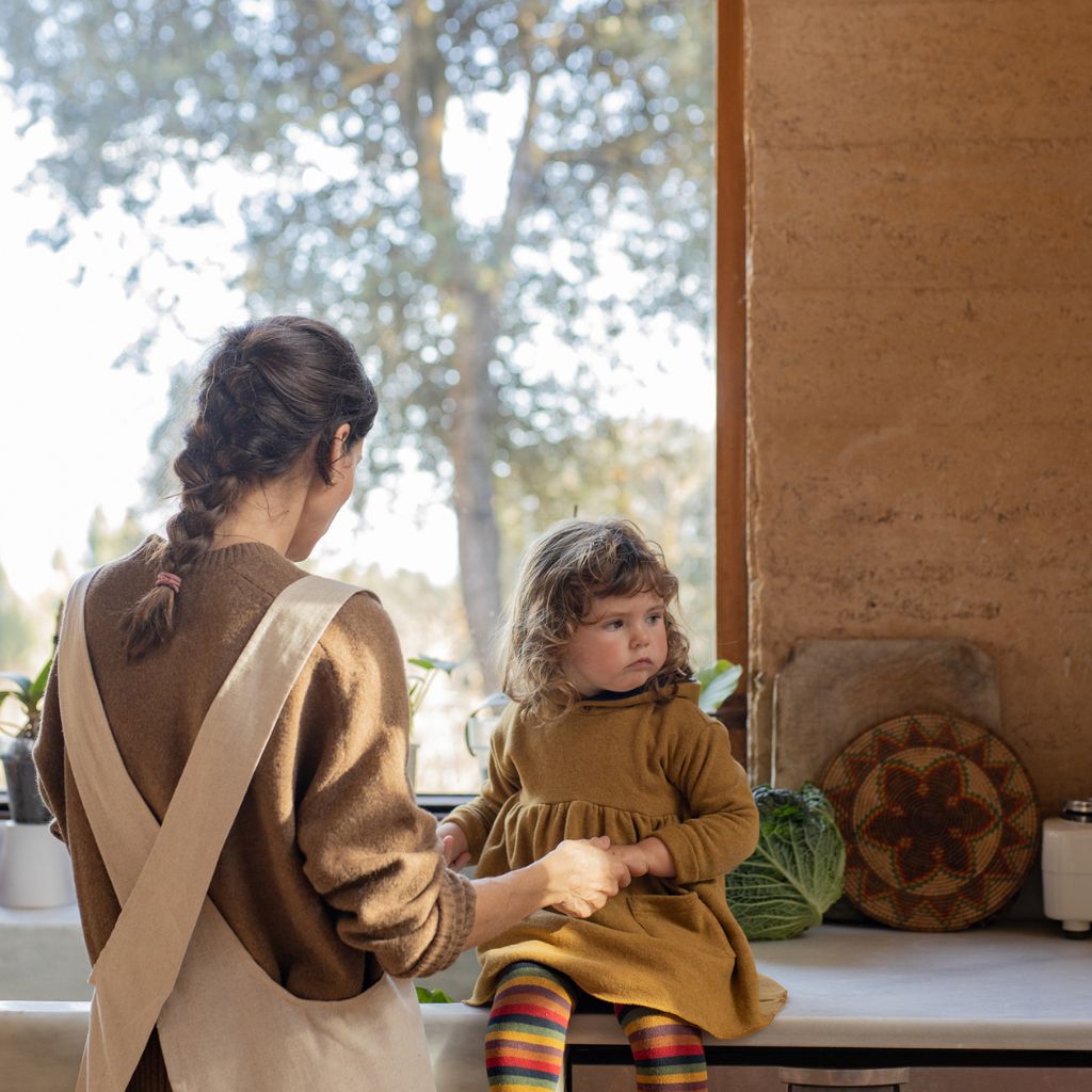1 + in the Family MANITOBA ochre baby hooded dress in soft fleece with a contrast-lined hood