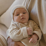 1 + in the Family METZ beige newborn footed sleeper in soft striped fleece with a button front