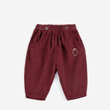 Bobo Choses Baby Curious Owl corduroy pants in burgundy organic cotton cord, pull on waist