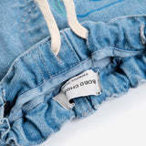 Bobo Choses Baby BC embossed denim pants in blue organic cotton, embossed logo texture, pull on
