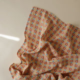 Mushie Organic Cotton Muslin Baby Swaddle - Happy Flowers Check
