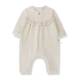 1 + in the Family MERIGNAC ivory newborn jumpsuit in soft capsule fleece with a ruffled collar