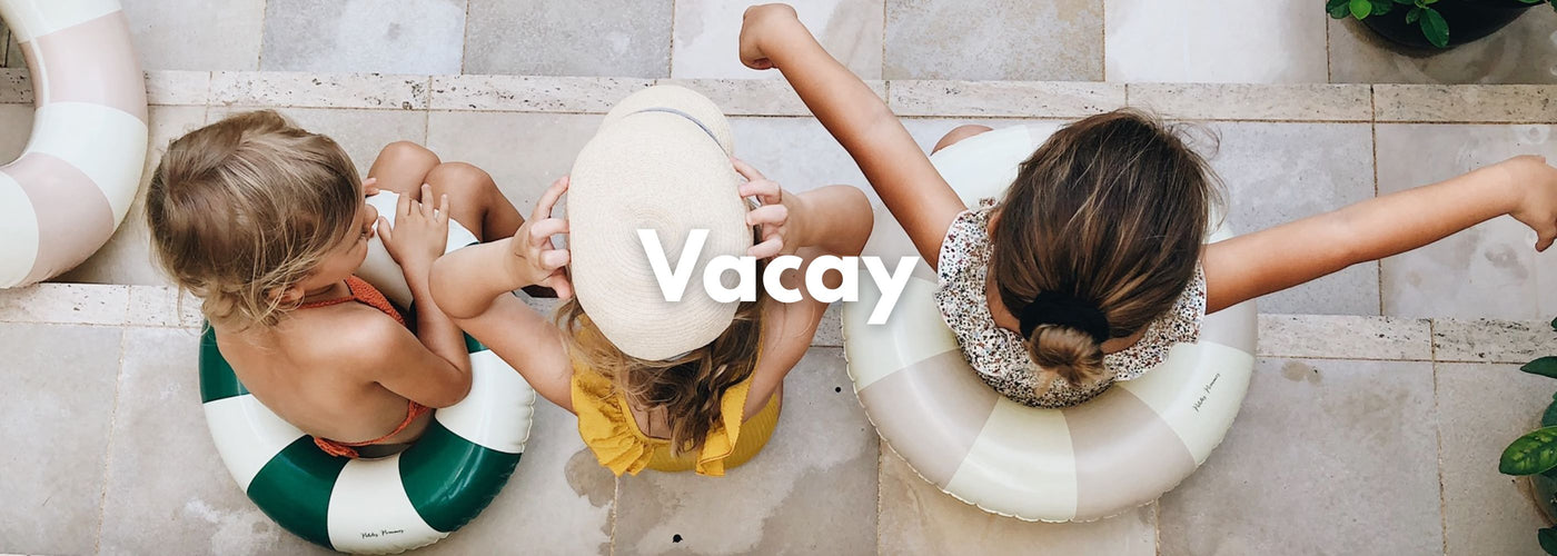 Three children playing in a pool with 'Vacay' text overlay.
