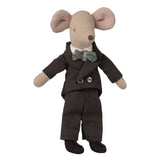 Stuffed toy mouse in a suit on a white background